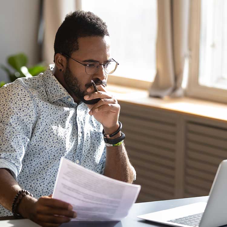 Tax Forms | Man Thinking